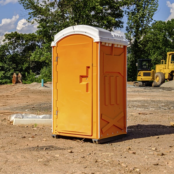 how often are the porta potties cleaned and serviced during a rental period in Racine